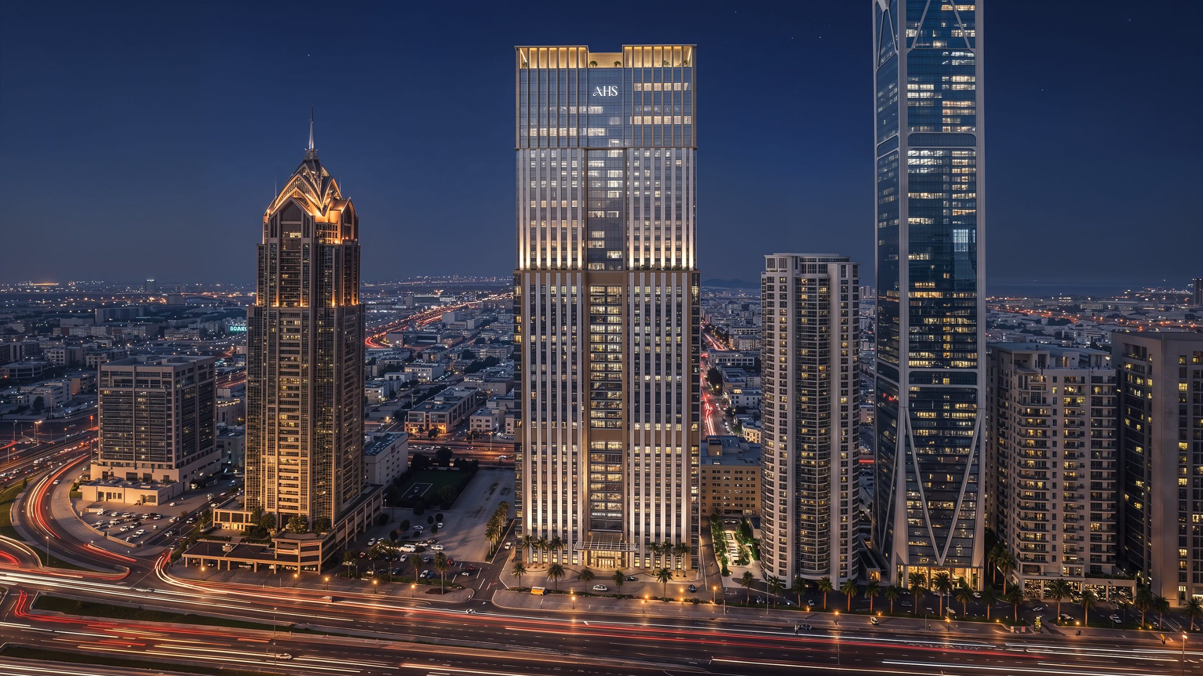 AHS Twin Towers at night on Sheikh Zayed Road